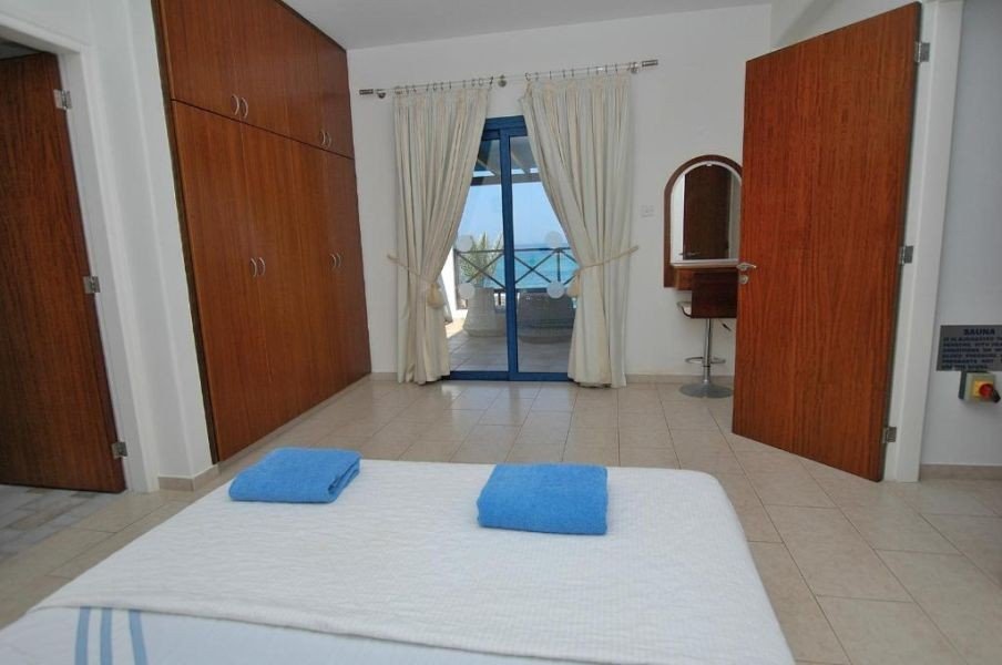 Beachfront villa on large plot in Paphos