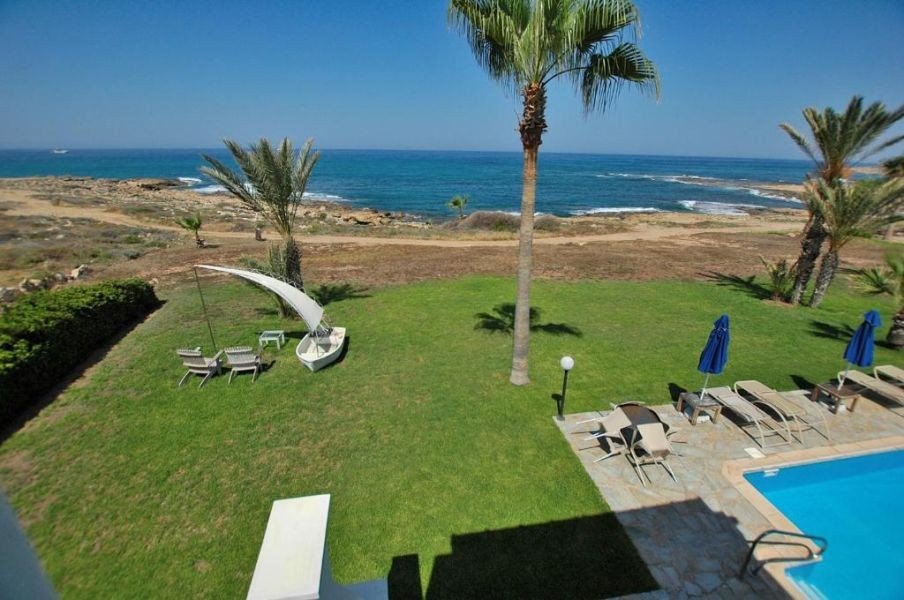 Beachfront villa on large plot in Paphos