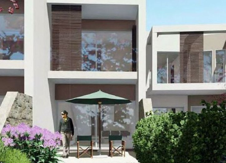 Terraced house in club resort with sea view