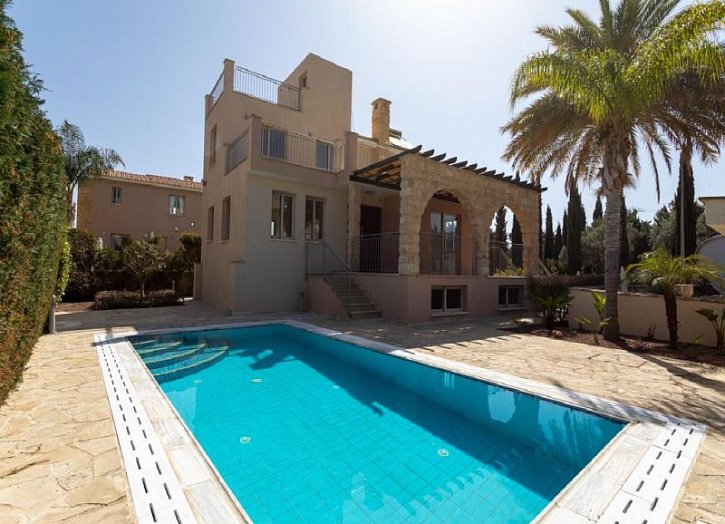 Villa in seafront development by beach