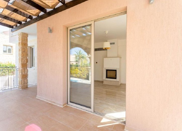 Villa in seafront development by beach
