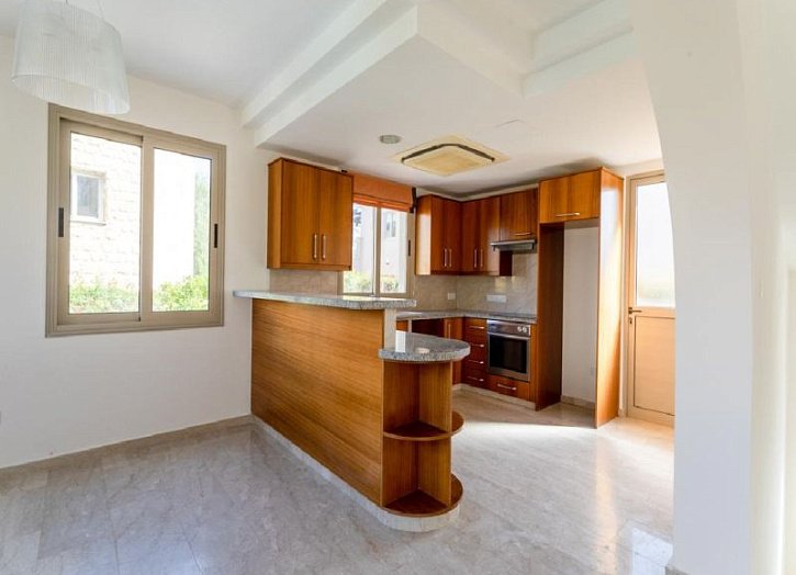 Villa in seafront development by beach