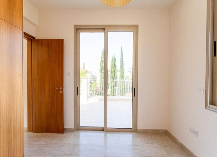 Villa in seafront development by beach