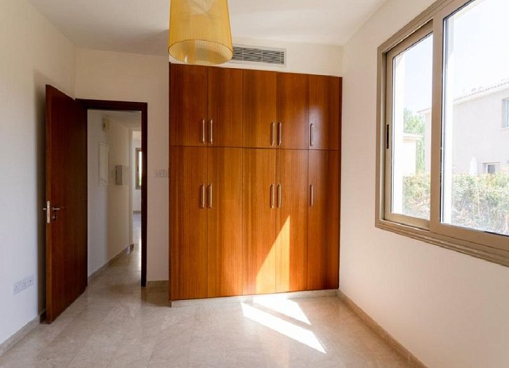 Villa in seafront development by beach