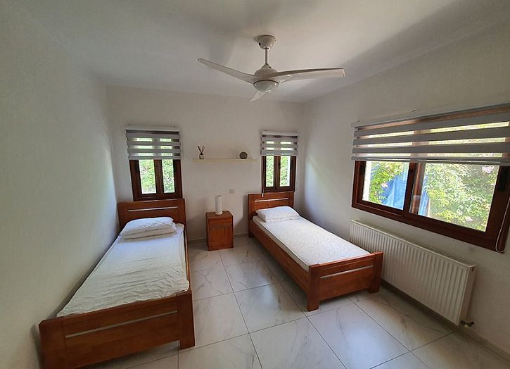 Bungalow mit Meer- & Bergblick