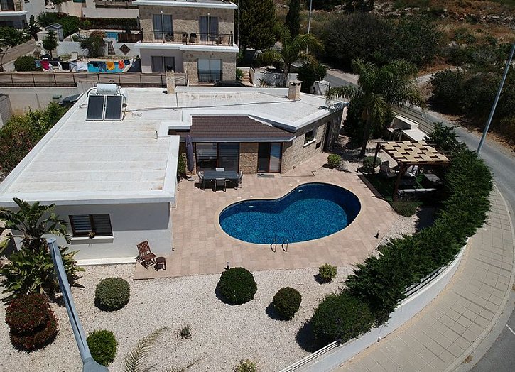 Bungalow mit Meer- & Bergblick