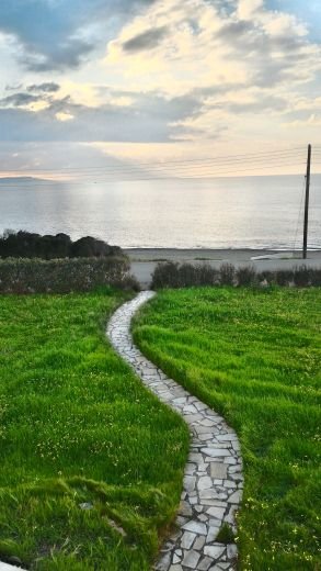 Strandfront-Entwicklung mit 7 Häusern